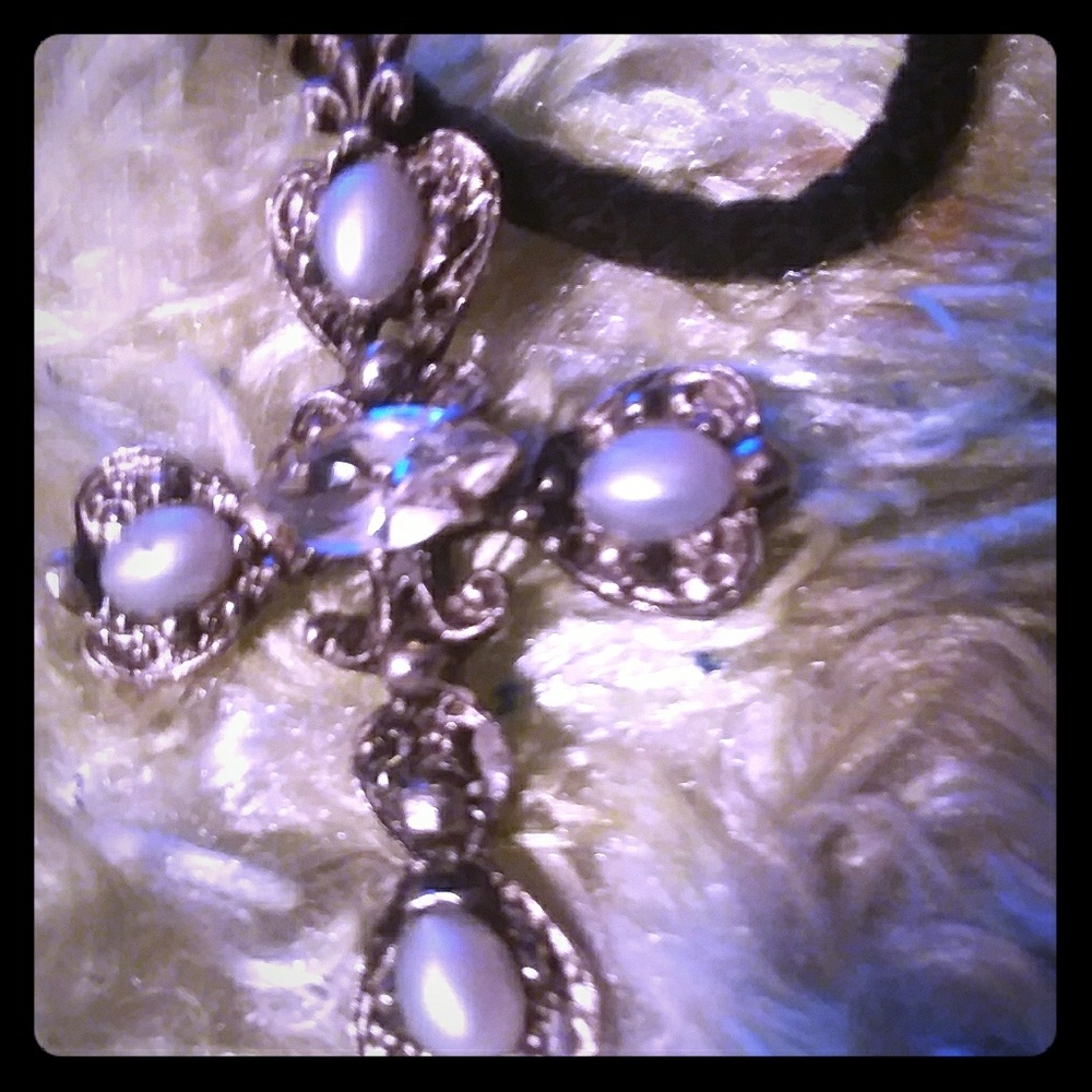 Cross with center Rhinestone and Pearls.